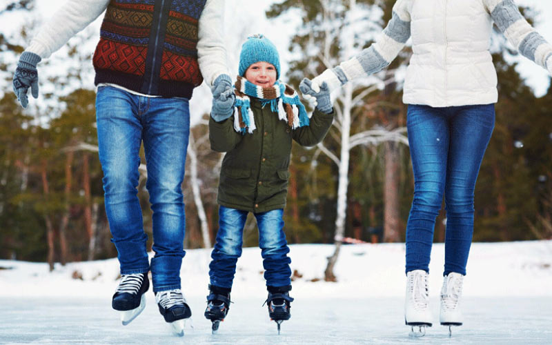 family enjoying ice skating, Birmingham winter trip, November 2024, UK