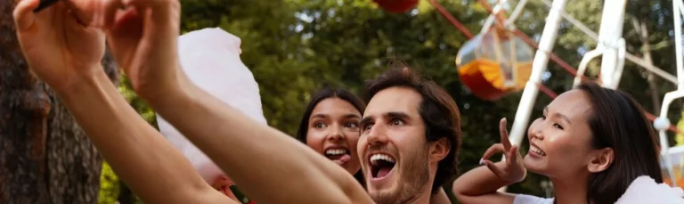 Family enjoying a thrilling ride at Alton Towers Pass theme park.