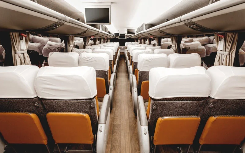 Modern coach parked in Birmingham city centre ready for group travel