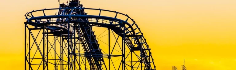An aerial view of Alton Towers Resorts in Staffordshire showcasing thrilling roller coasters and stunning scenery.